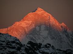 
The Makalu West Face changes from white to yellow to orange to a soft red in the last rays of the sun from Gokyo Ri.
